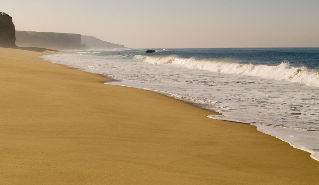 Escape to Sesimbra, Portugal, and indulge in the natural beauty of its stunning beaches. From golden sands to hidden coves, experience a coastal paradise just a short day trip away from Lisbon.