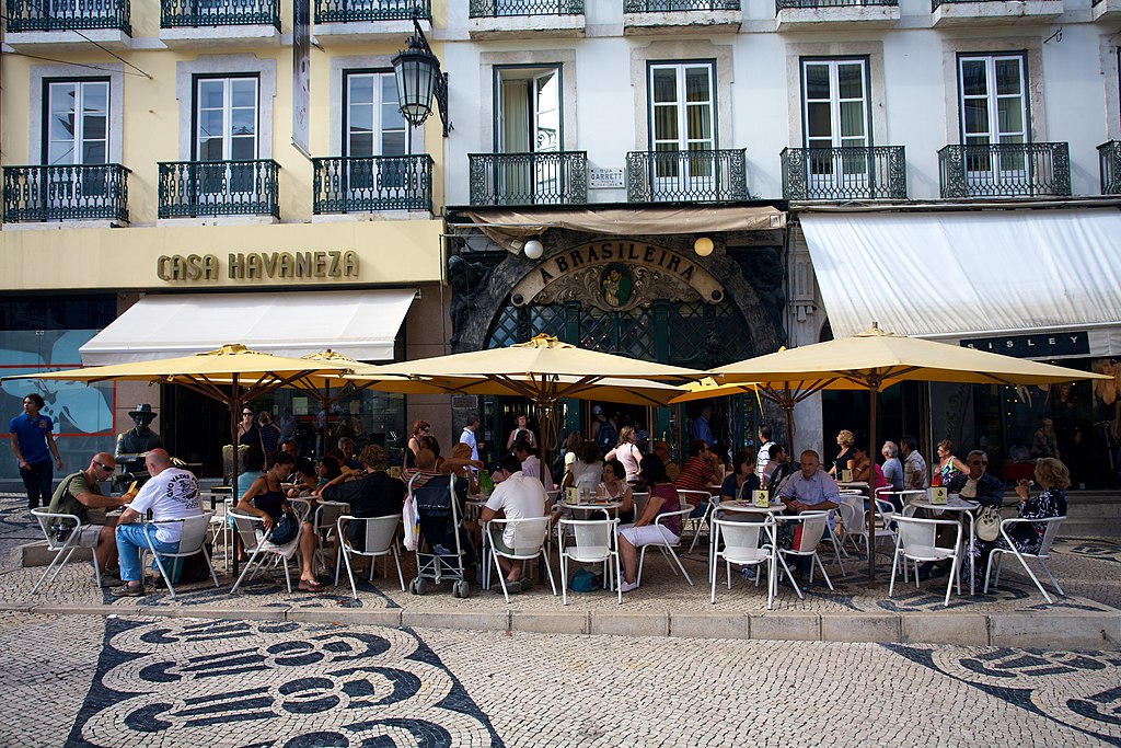 Explore Café A Brasileira, Lisbon's historic cultural icon since 1905, known for its architecture, coffee heritage, and association with Fernando Pessoa.