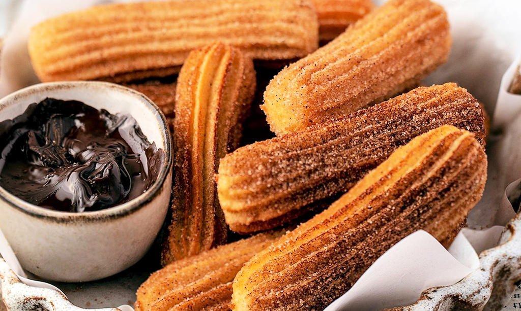 Indulge in the rich history and unique flavors of churros, while discovering Lisbon's culinary delights that blend tradition with innovation.