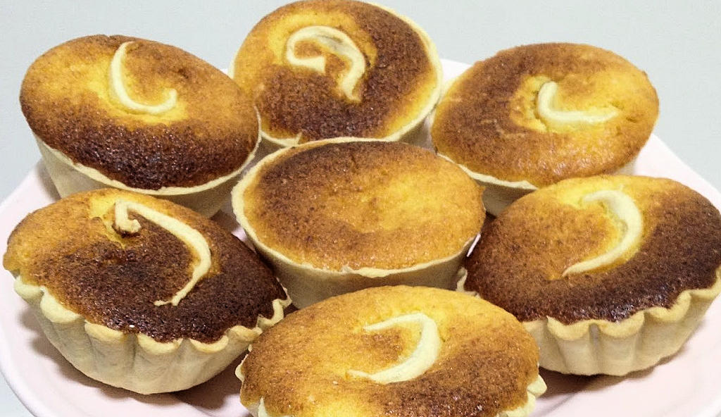 Embark on a delightful journey through Lisbon's culinary heritage with Queijadas de Gila – traditional Portuguese pastries filled with the sweet flavors of gila, eggs, sugar, and almond.