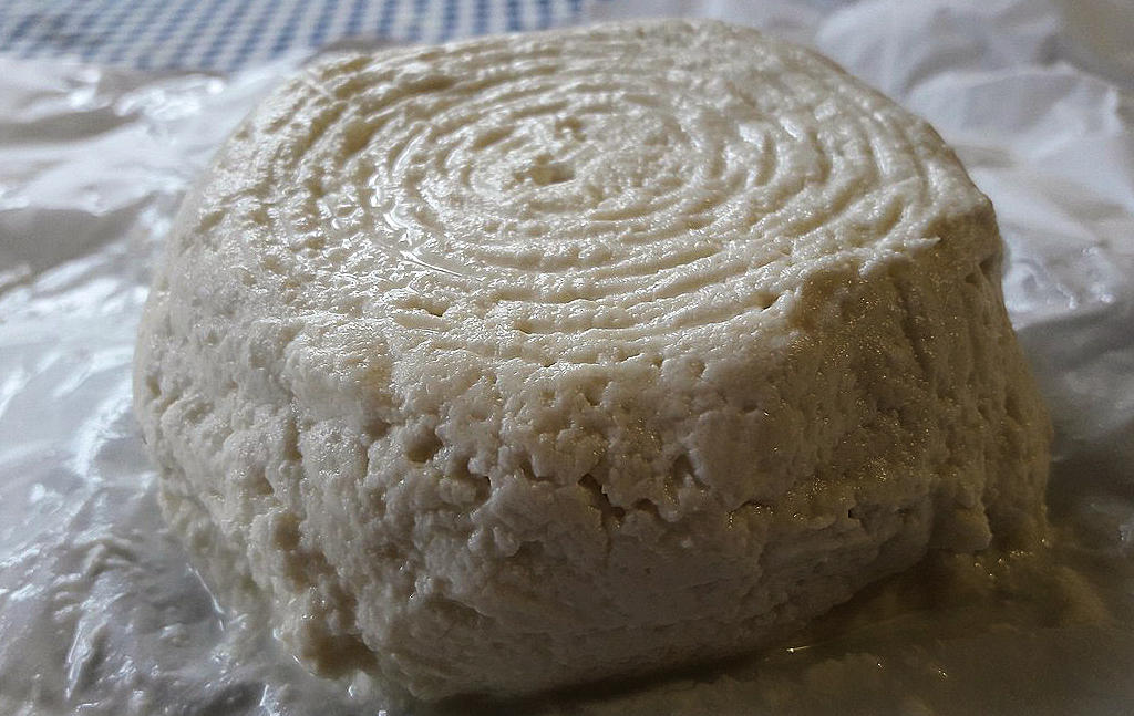 Queijo Fresco de Cabra Transmontano: A traditional goat cheese from Portugal's Trás-os-Montes region, capturing the essence of a rich culinary heritage.