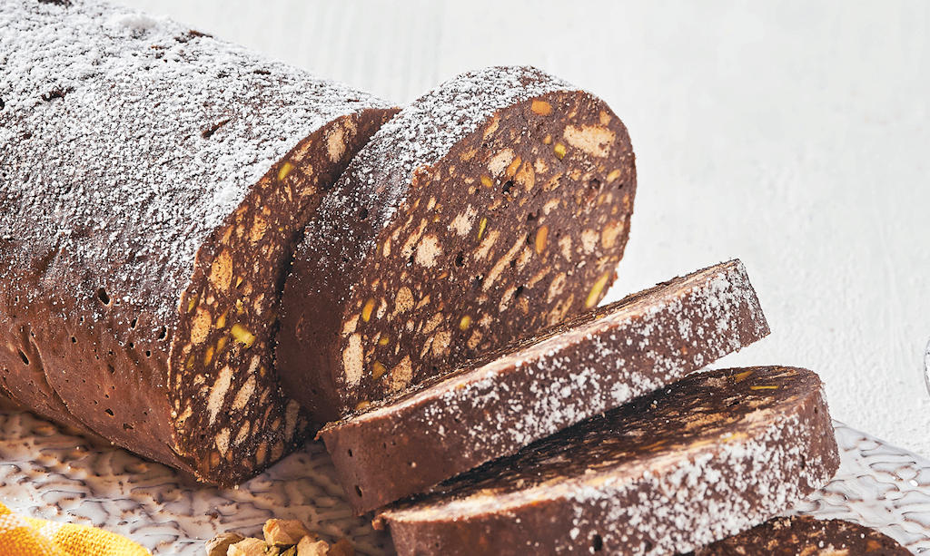 Experience the rich fusion of Portuguese and Italian flavors in Salame de Chocolate, a decadent dessert that tells a tale of cultural harmony and indulgent bliss in Lisbon.