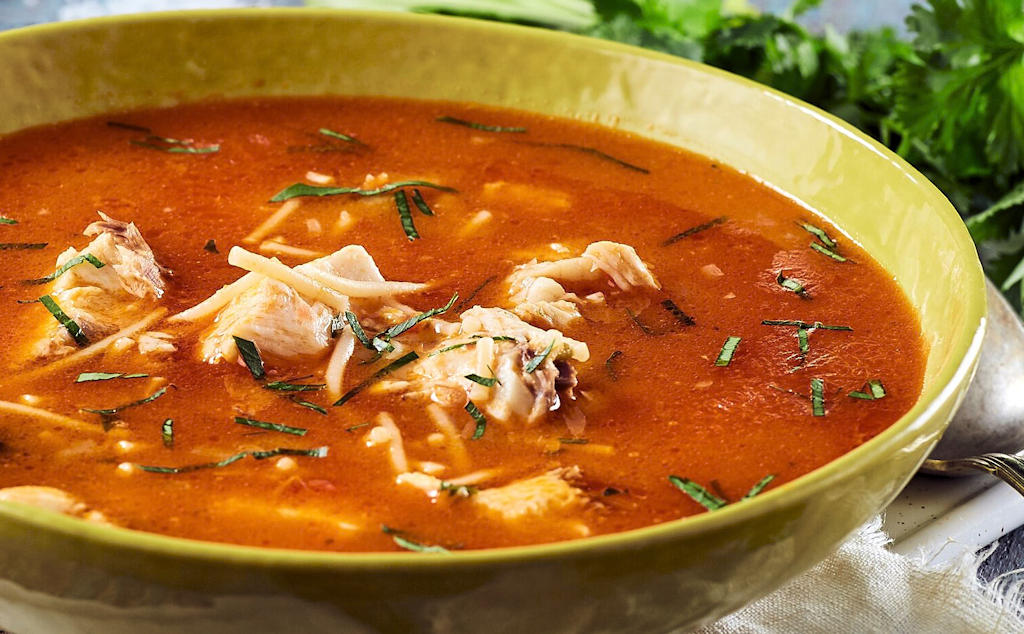 Experience the coastal flavors and cultural significance of Sopa de Peixe, a traditional Portuguese fish soup that tantalizes your taste buds and celebrates the country's rich maritime heritage.